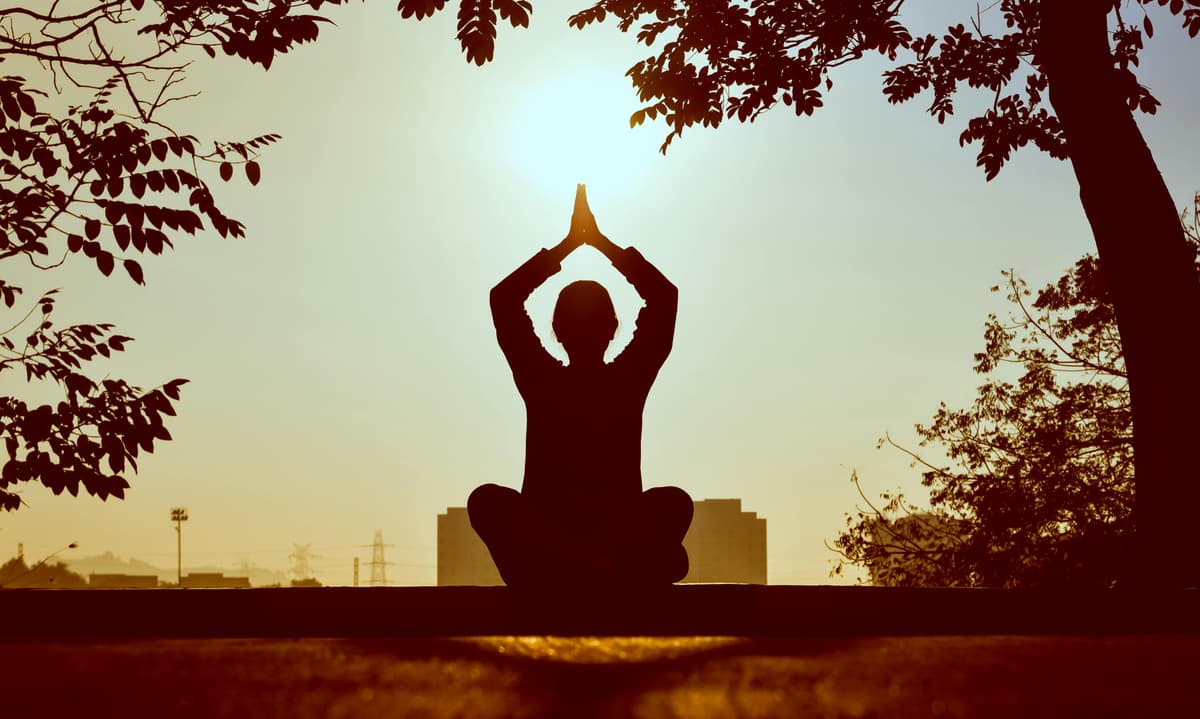 Sunset meditation and mindfulness by the sea